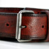 Antique red leather dog collar-buckle detail