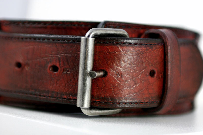 Antique red leather dog collar-buckle detail