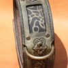 Green leather dog collar with brass patina fittings
