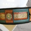Dog collar with brass ornaments by Workshop Sauri